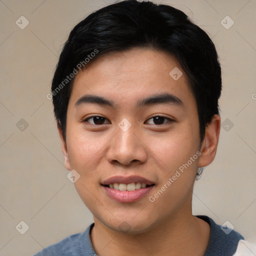 Joyful asian young-adult male with short  black hair and brown eyes