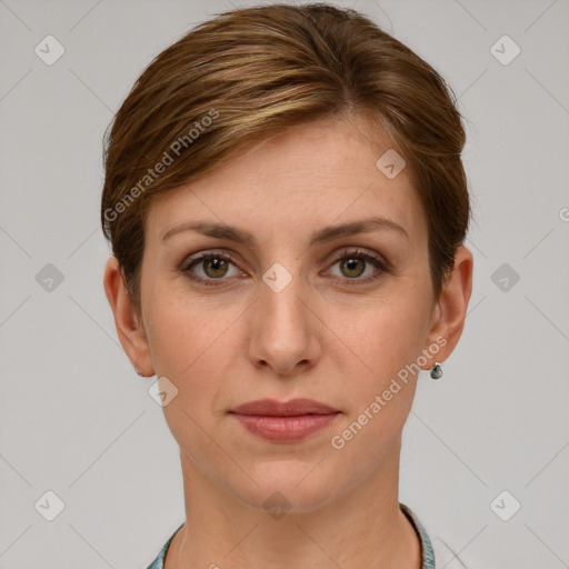 Joyful white young-adult female with short  brown hair and grey eyes