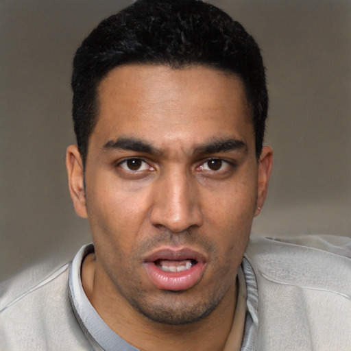 Neutral white young-adult male with short  black hair and brown eyes