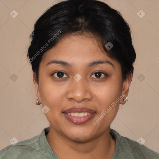 Joyful latino young-adult female with short  brown hair and brown eyes