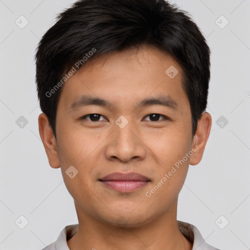 Joyful asian young-adult male with short  brown hair and brown eyes