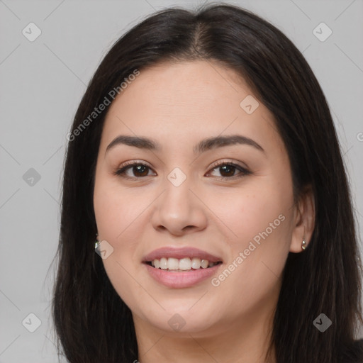 Joyful asian young-adult female with long  brown hair and brown eyes