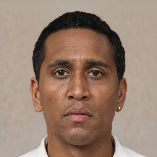 Neutral black adult male with short  black hair and brown eyes