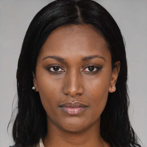 Neutral black young-adult female with long  black hair and brown eyes
