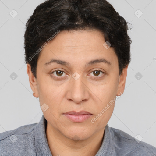 Joyful white adult female with short  brown hair and brown eyes