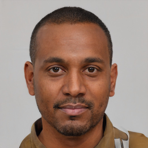 Neutral latino young-adult male with short  brown hair and brown eyes