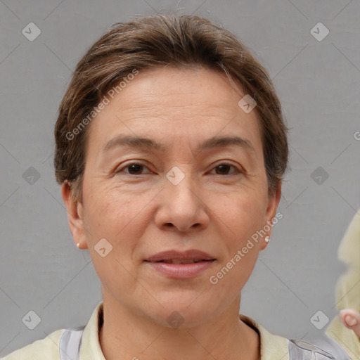 Joyful white adult female with short  brown hair and brown eyes