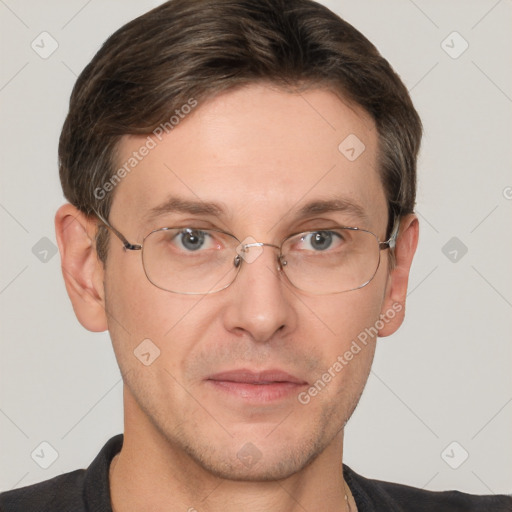 Joyful white adult male with short  brown hair and grey eyes