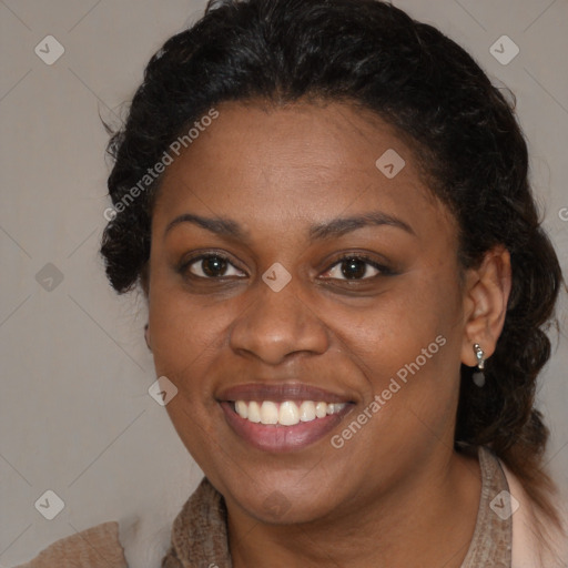 Joyful black young-adult female with medium  brown hair and brown eyes