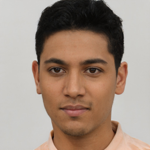Neutral latino young-adult male with short  black hair and brown eyes