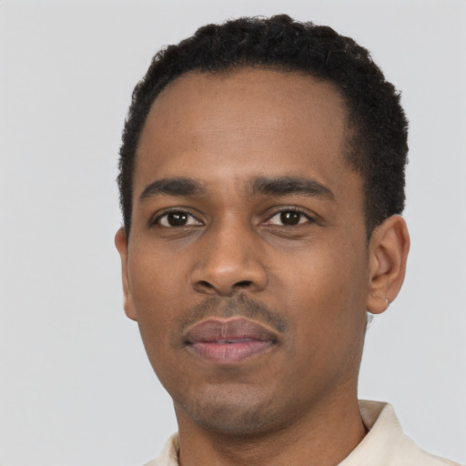 Neutral black young-adult male with short  black hair and brown eyes