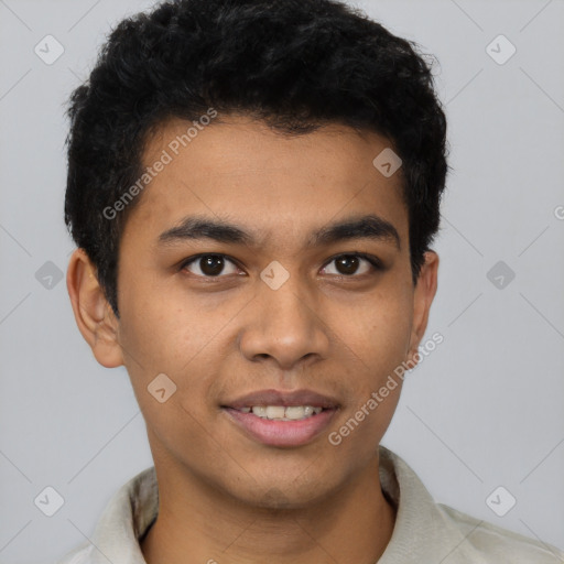 Joyful latino young-adult male with short  brown hair and brown eyes