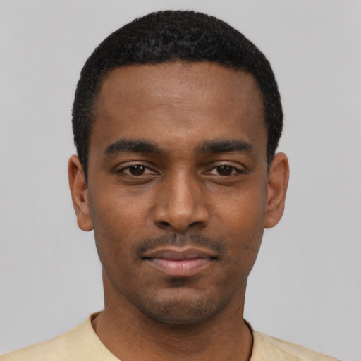 Neutral black young-adult male with short  black hair and brown eyes