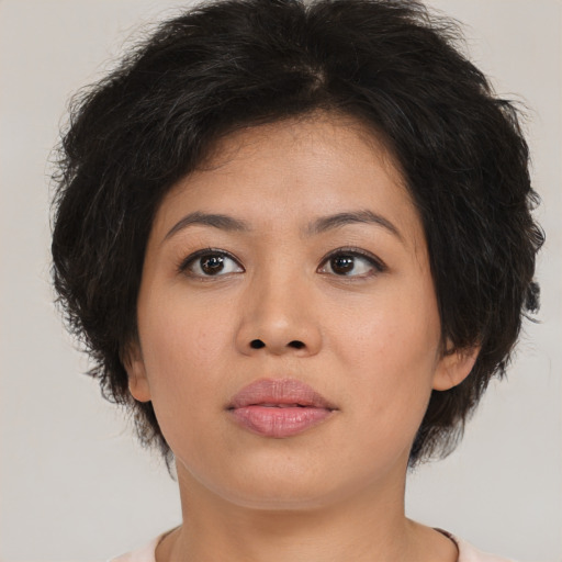 Neutral asian young-adult female with medium  brown hair and brown eyes