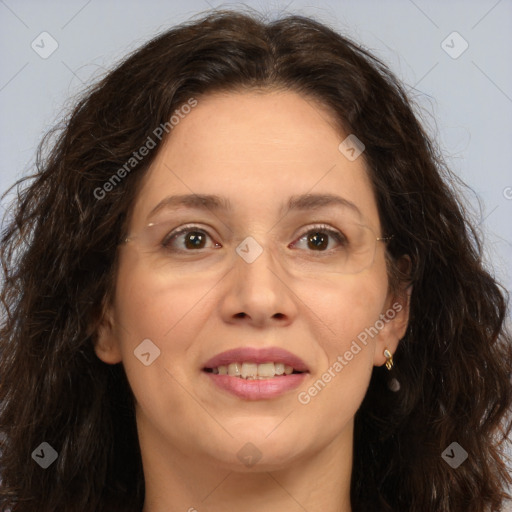 Joyful white adult female with long  brown hair and brown eyes