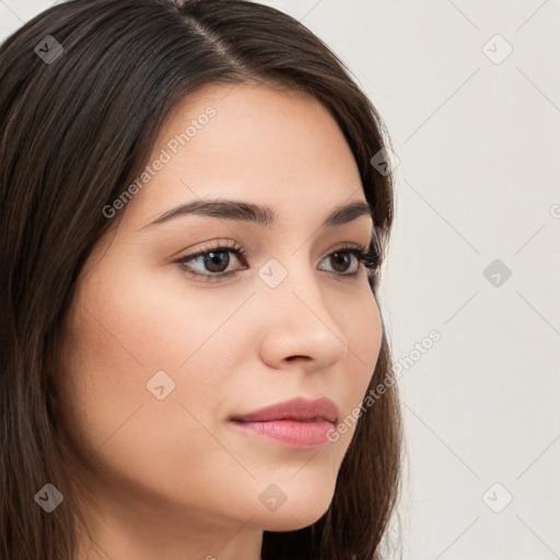 Neutral white young-adult female with long  brown hair and brown eyes