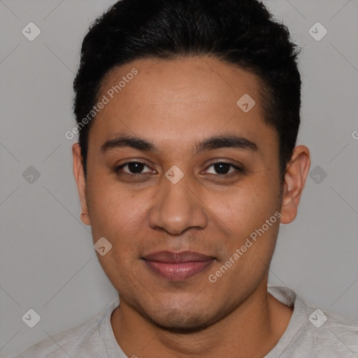 Joyful latino young-adult male with short  black hair and brown eyes