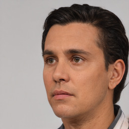 Neutral white adult male with short  black hair and brown eyes