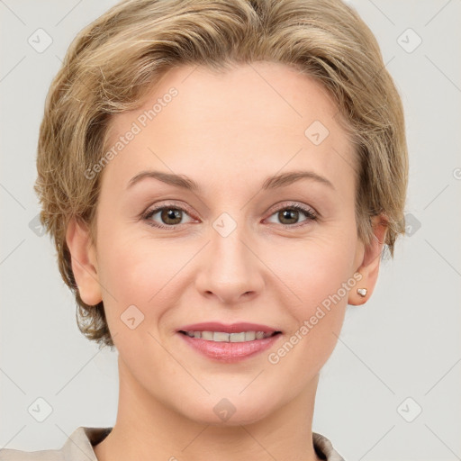 Joyful white young-adult female with short  brown hair and grey eyes