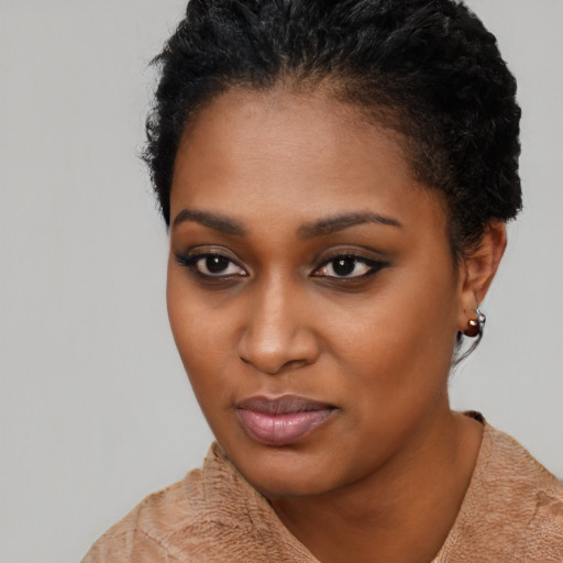 Neutral black young-adult female with short  black hair and brown eyes