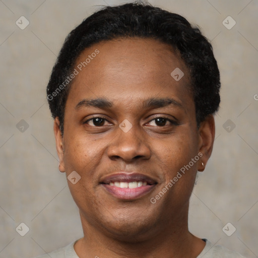 Joyful black young-adult male with short  black hair and brown eyes