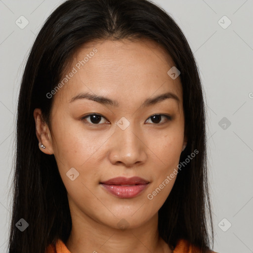 Joyful asian young-adult female with long  brown hair and brown eyes