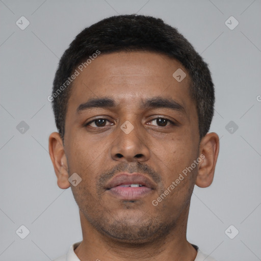 Neutral latino young-adult male with short  brown hair and brown eyes