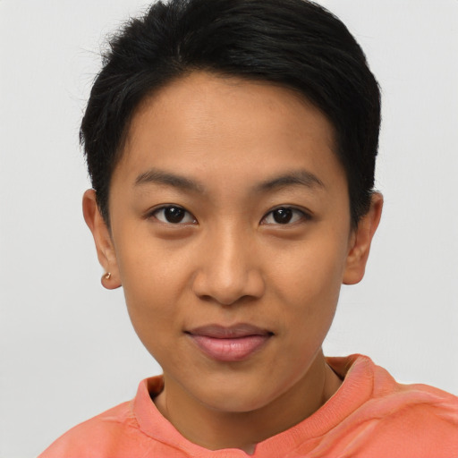 Joyful asian young-adult female with short  brown hair and brown eyes