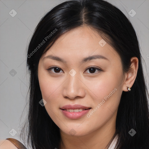 Joyful asian young-adult female with long  brown hair and brown eyes