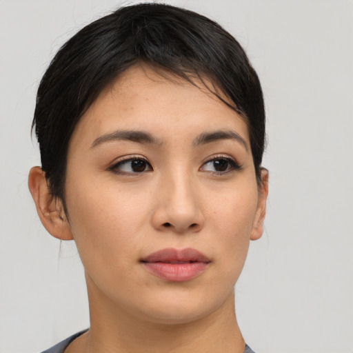 Neutral asian young-adult female with short  brown hair and brown eyes