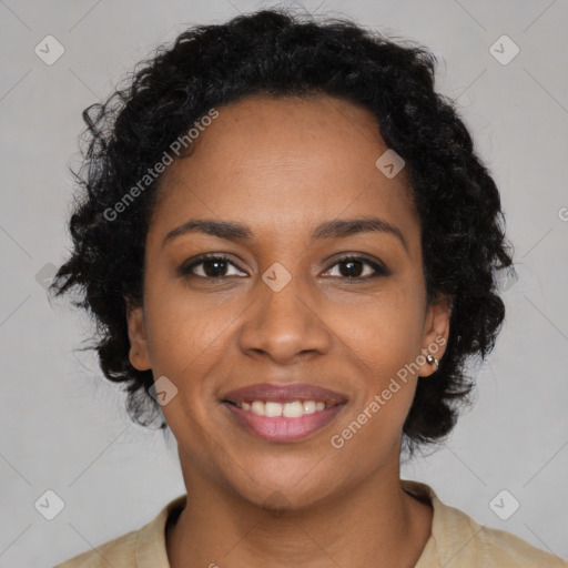 Joyful black young-adult female with long  brown hair and brown eyes