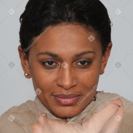 Joyful black young-adult female with short  brown hair and brown eyes