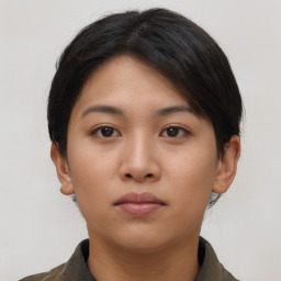 Neutral asian young-adult female with short  brown hair and brown eyes