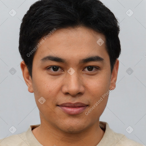 Joyful asian young-adult male with short  black hair and brown eyes