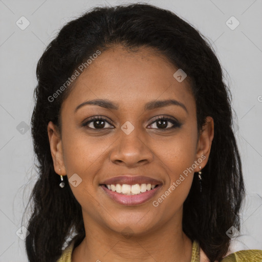 Joyful black young-adult female with medium  brown hair and brown eyes