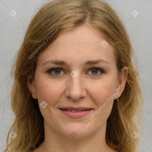 Joyful white young-adult female with long  brown hair and green eyes