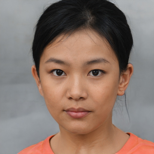 Neutral asian young-adult female with short  brown hair and brown eyes