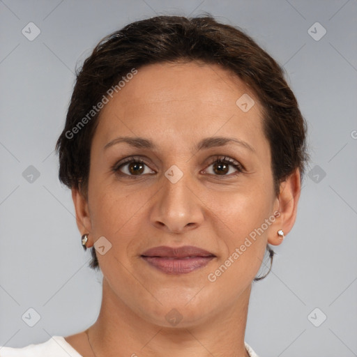 Joyful white adult female with short  brown hair and brown eyes