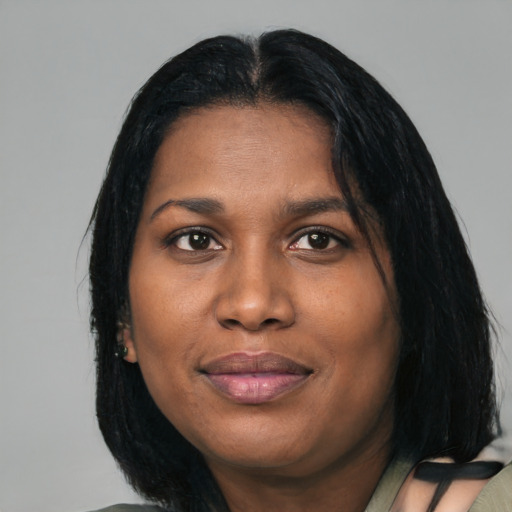 Joyful asian young-adult female with medium  black hair and brown eyes
