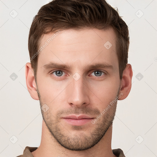 Neutral white young-adult male with short  brown hair and grey eyes