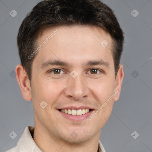 Joyful white young-adult male with short  brown hair and brown eyes