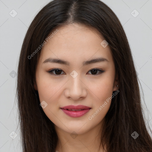 Joyful asian young-adult female with long  brown hair and brown eyes