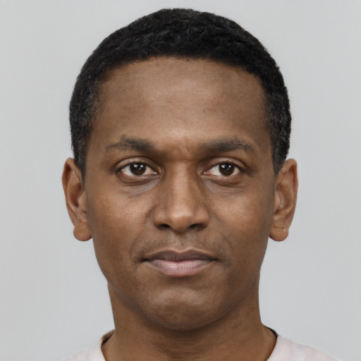 Neutral black young-adult male with short  black hair and brown eyes