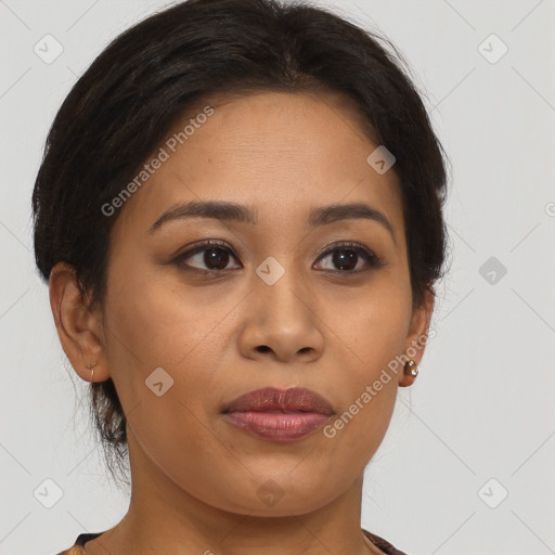 Joyful latino young-adult female with medium  brown hair and brown eyes