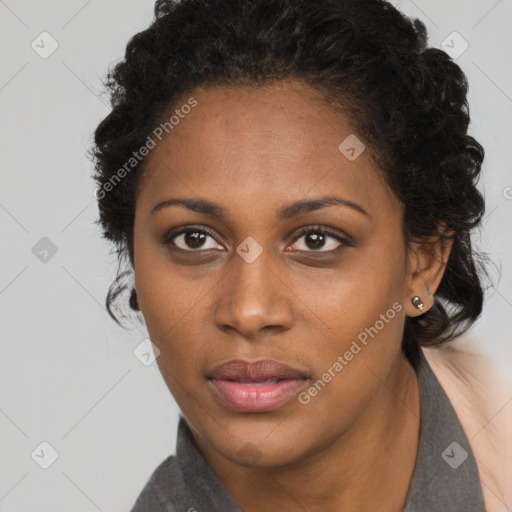 Neutral black young-adult female with long  brown hair and brown eyes