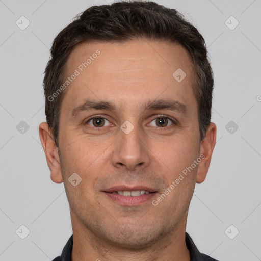 Joyful white adult male with short  brown hair and brown eyes