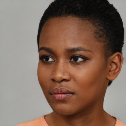 Neutral black young-adult female with short  brown hair and brown eyes