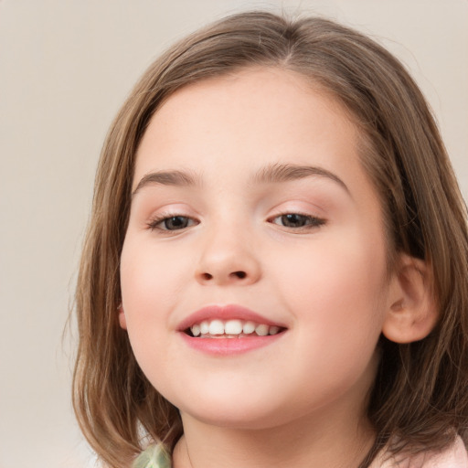 Joyful white child female with medium  brown hair and brown eyes