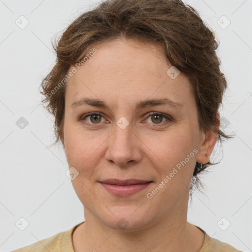 Joyful white adult female with short  brown hair and brown eyes