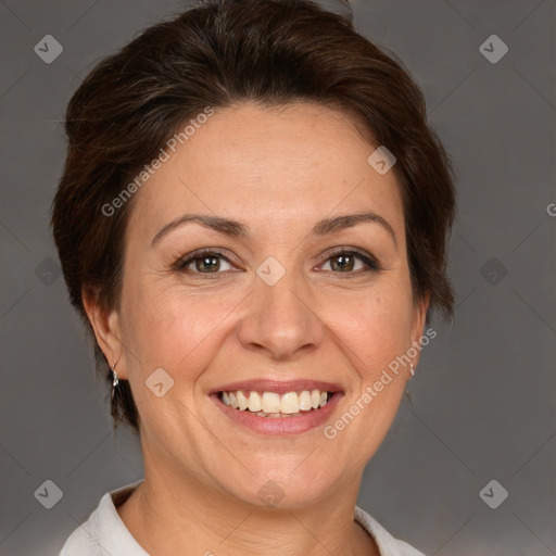 Joyful white adult female with short  brown hair and brown eyes